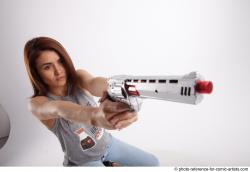 MOLLY SITTING POSE WITH GUN